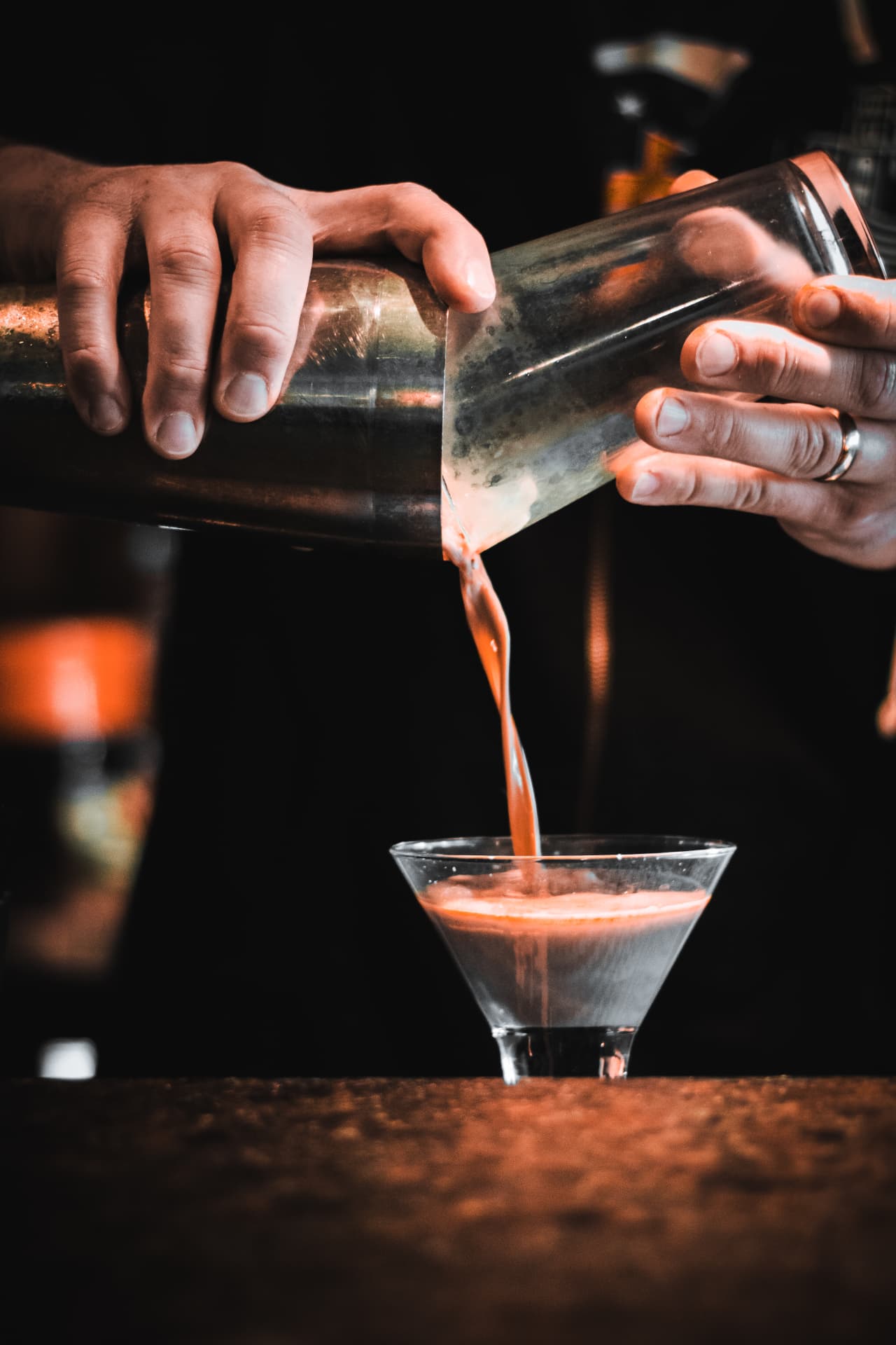 Fatso’s Bar & Grill cocktail being poured into a martini glass