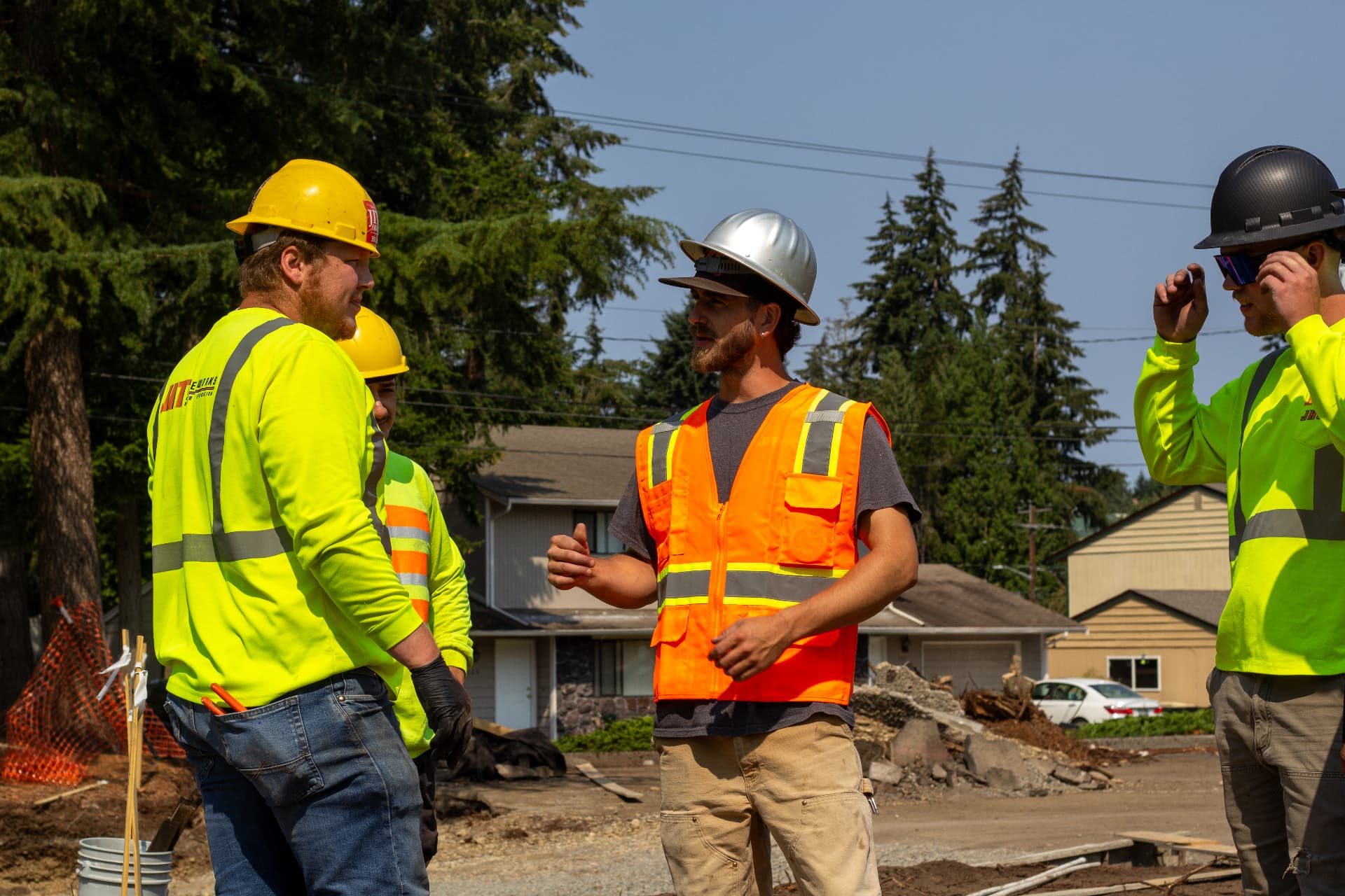 JIT Landscaping and Waterworks team coordinating at a jobsite