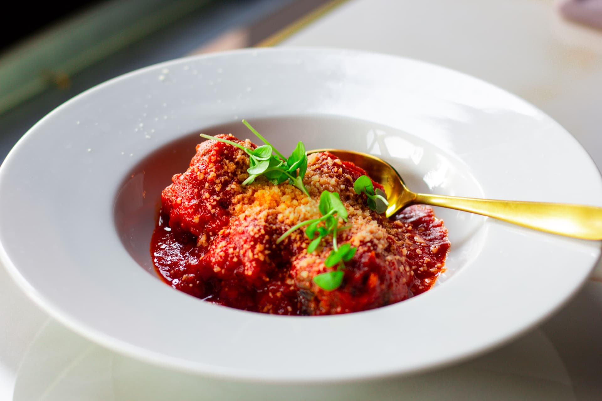 Bottega meatballs photographed for social media